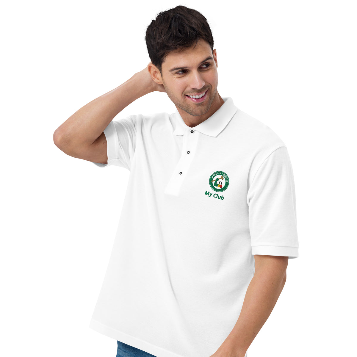 Man wearing a white polo shirt with a mallet and arm logo