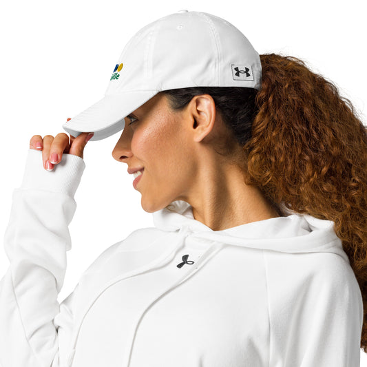 woman in a white cap with a croquet logo