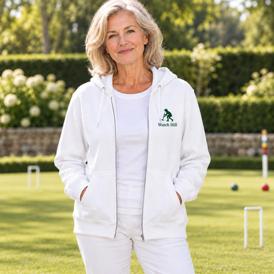 A woman  wearing a white zip-up hoodie with a green  croquet logo on the left chest