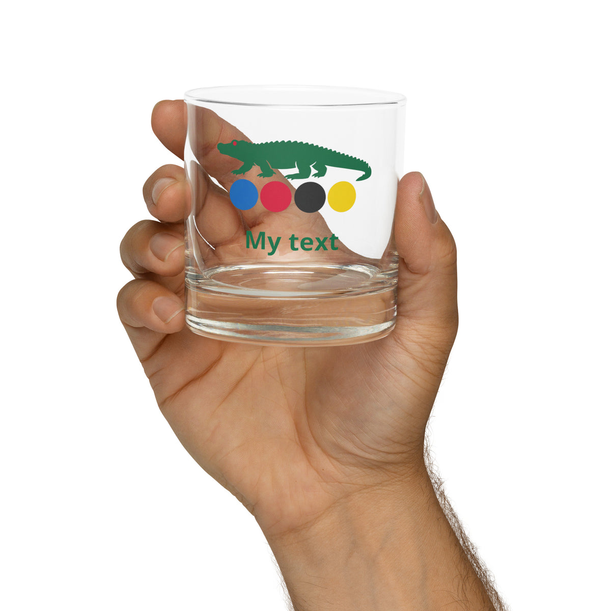 rocks glass with a croquet logo